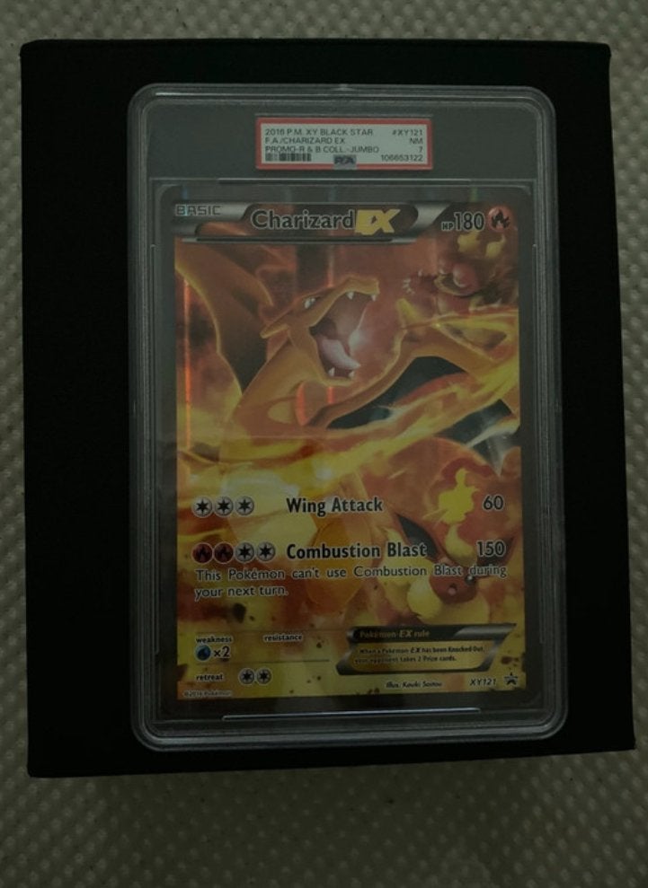 Charizard EX XY121 PSA 7 Pokémon Kaart, Ophalen of Verzenden, Zo goed als nieuw, Losse kaart, Foil