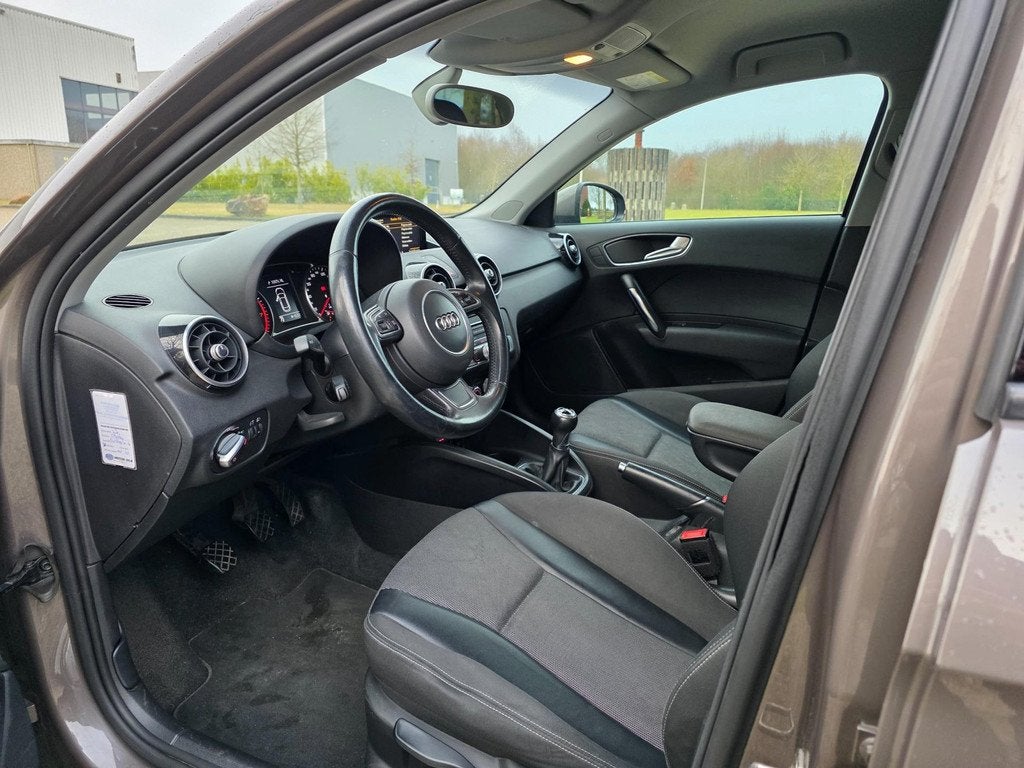 Audi A1 Sportback 1.0 TFSI 5-deurs AIRCO/cruise/STOELVERW, Auto's, Voorwielaandrijving, Euro 6, Bruin, Geïmporteerd