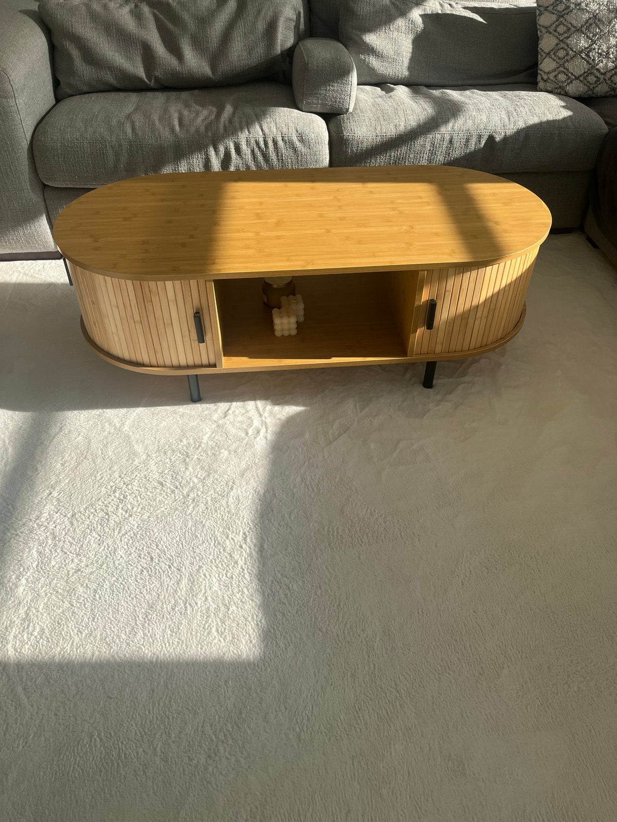 Ovale salontafel met opbergruimte, Ophalen, 100 tot 150 cm, 50 tot 100 cm, Zo goed als nieuw