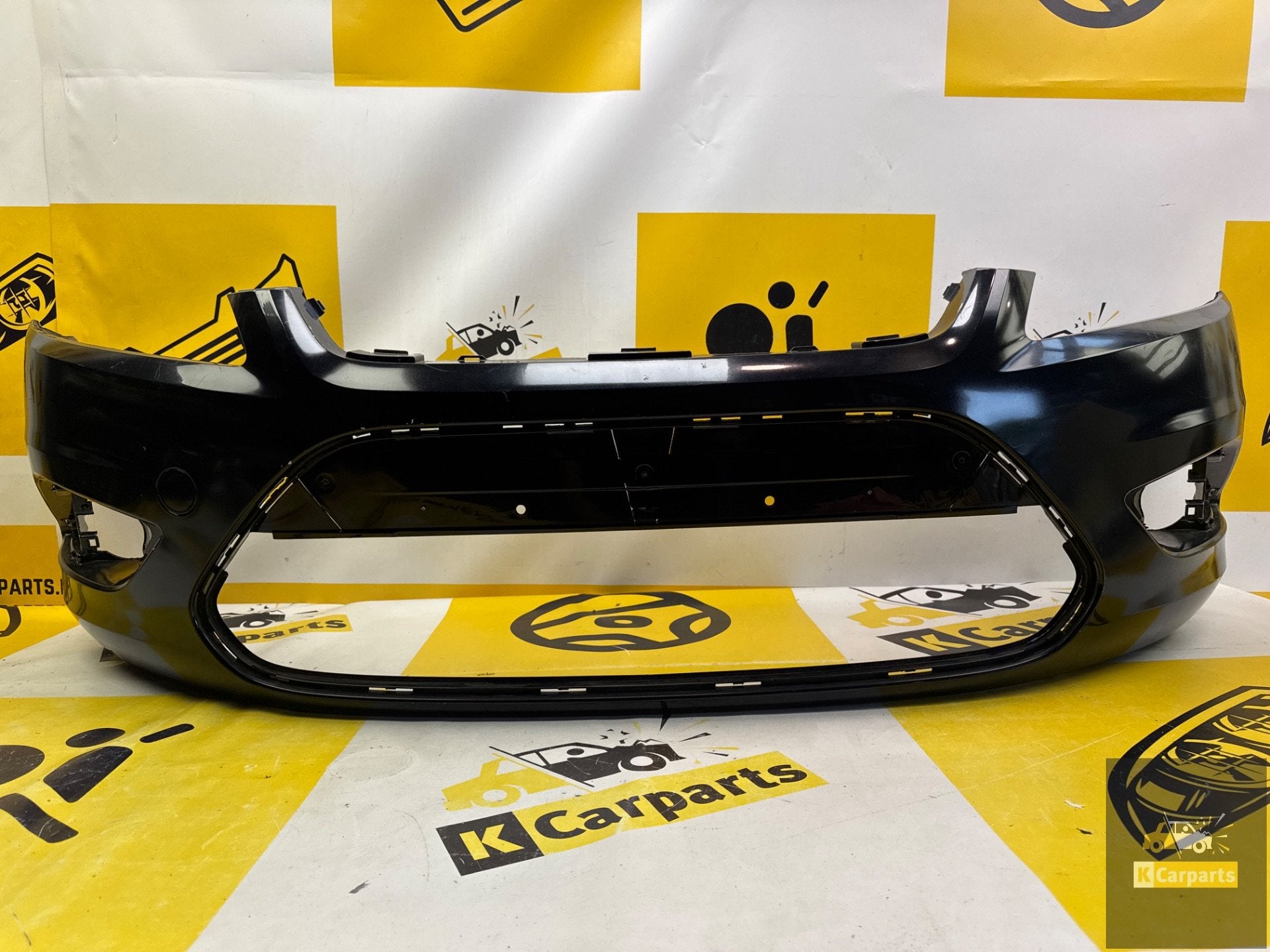 Ford Focus mk4 Voorbumper 2008-2011 8M5117757AW, Gebruikt, Voor, Info@ford.com, Ophalen of Verzenden
