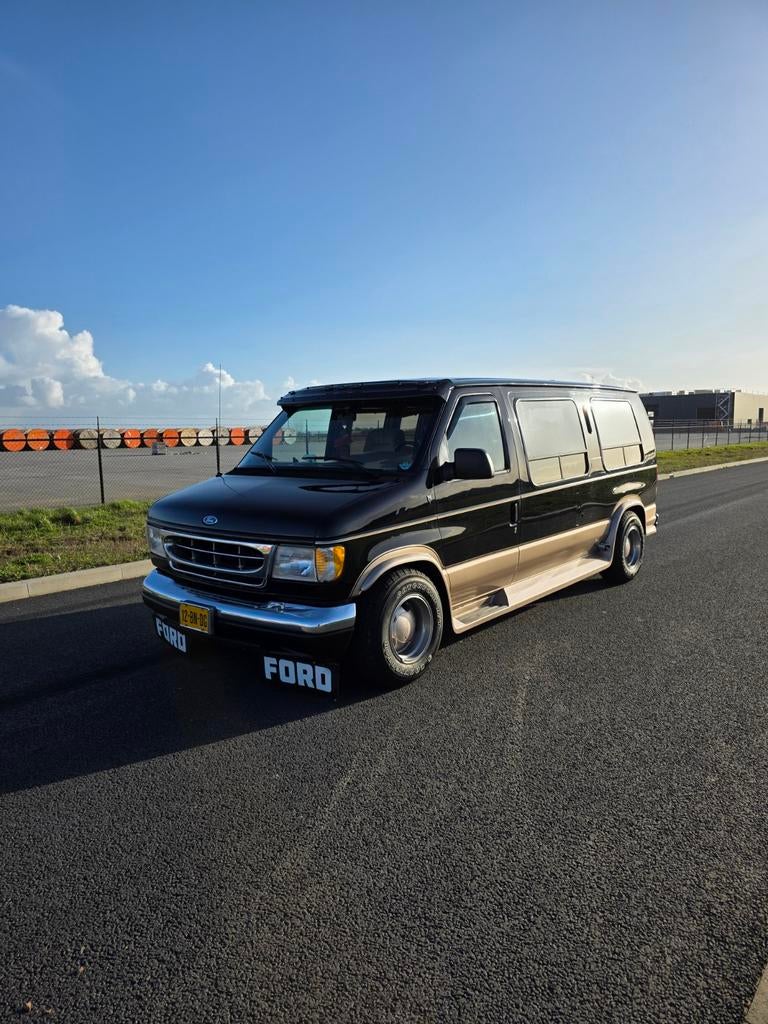 Ford Econoline E150 Globemaster 1995, Auto's, Zwart, 209 pk, Ford, Te koop