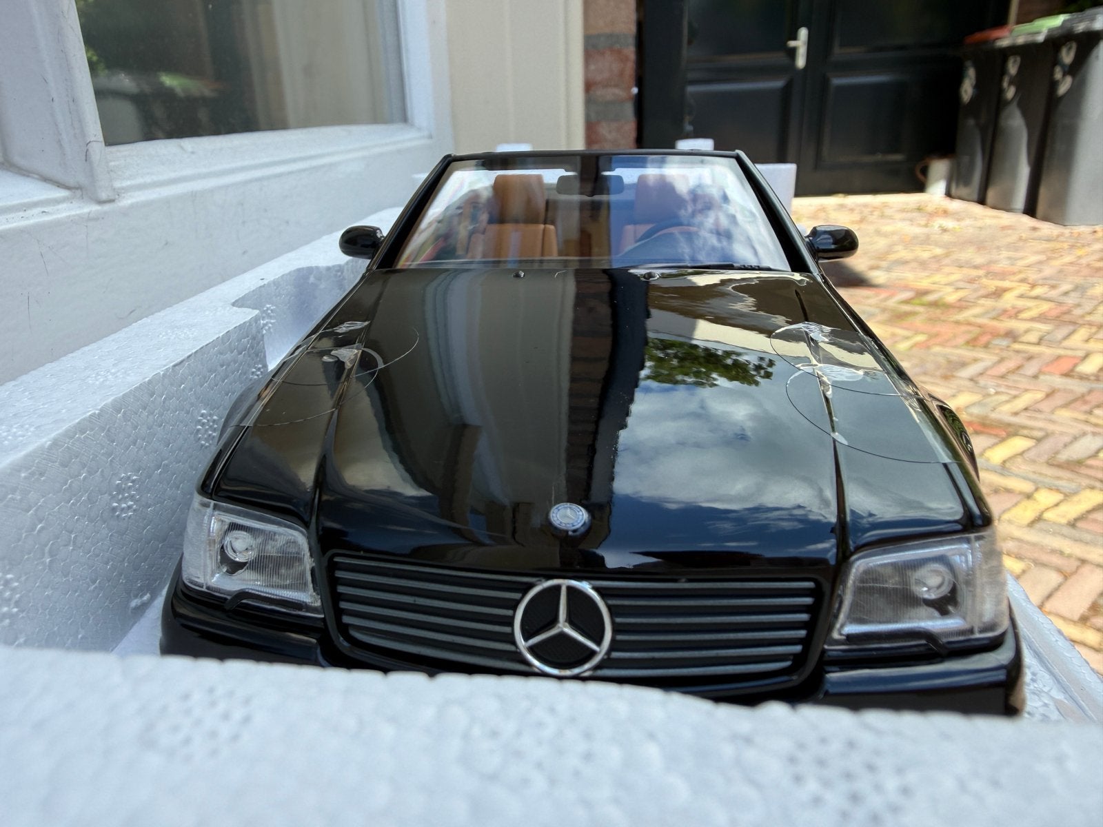 1:18 Mercedes R129 SL500 zwart 1999 Norev 183750, Hobby en Vrije tijd, Modelauto's | 1:18, Auto, Norev, 70-72 Av. de Bohlen, Vaulx-en-Velin, 69120, France