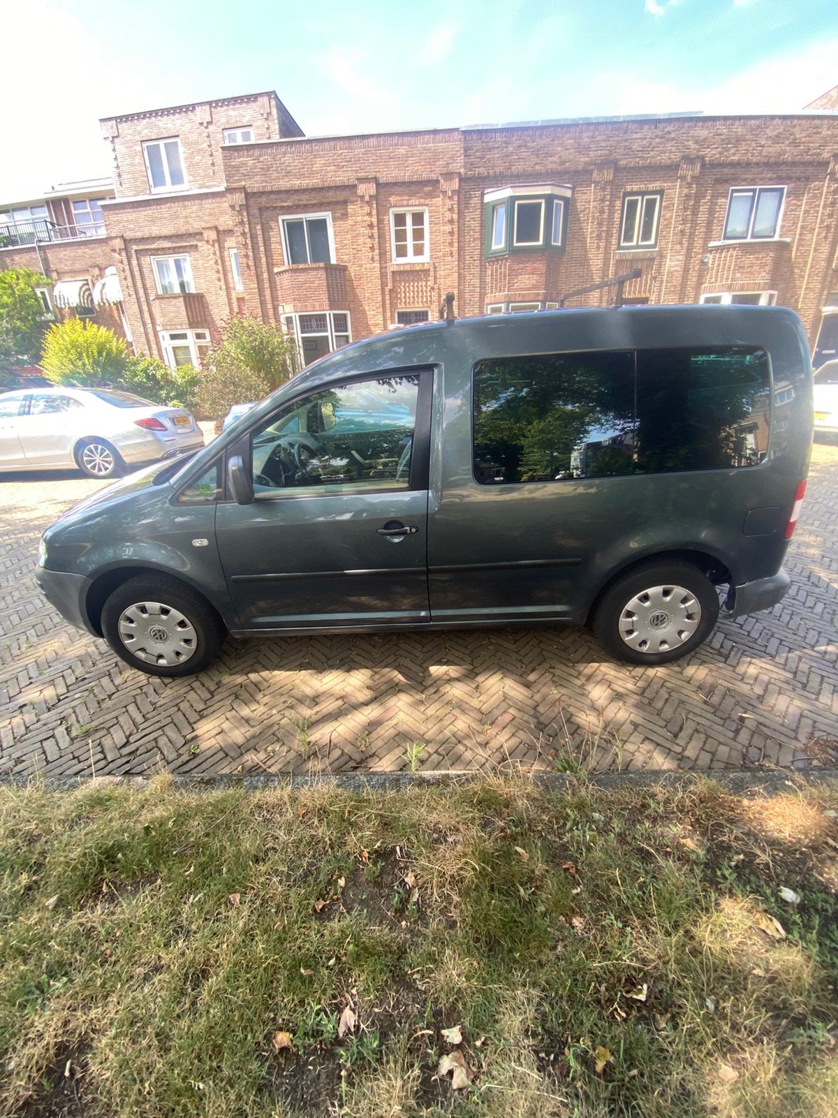 Volkswagen Caddy 1.6 75KW Kombi Grijs Benzine, Auto's, Bestelauto's, Voorwielaandrijving, 4 cilinders, Volkswagen, Bedrijf