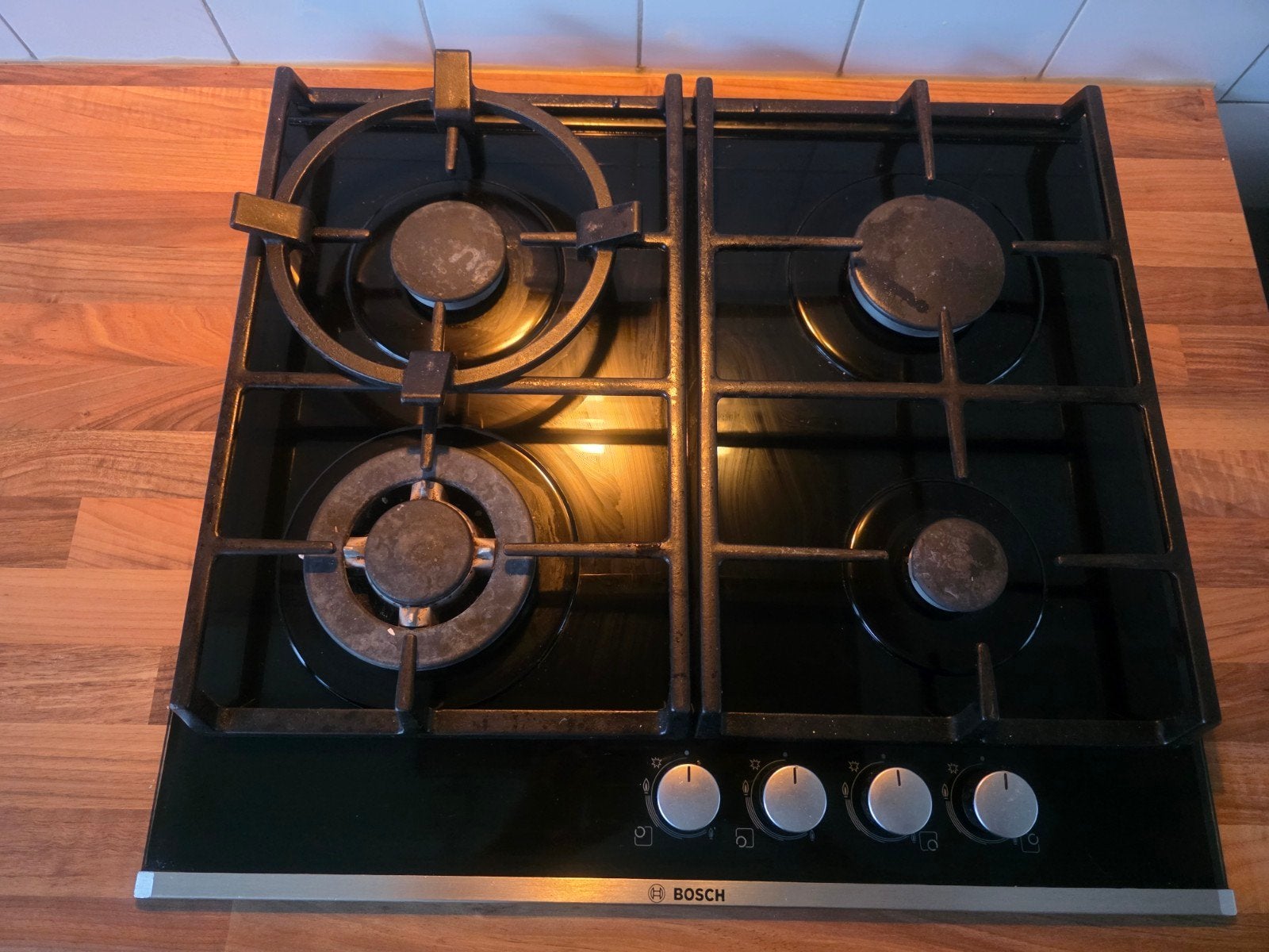 Bosch 4-pits gasfornuis - Zwart glas - Inbouw, Ophalen, Gebruikt, Minder dan 85 cm, 60 cm of meer