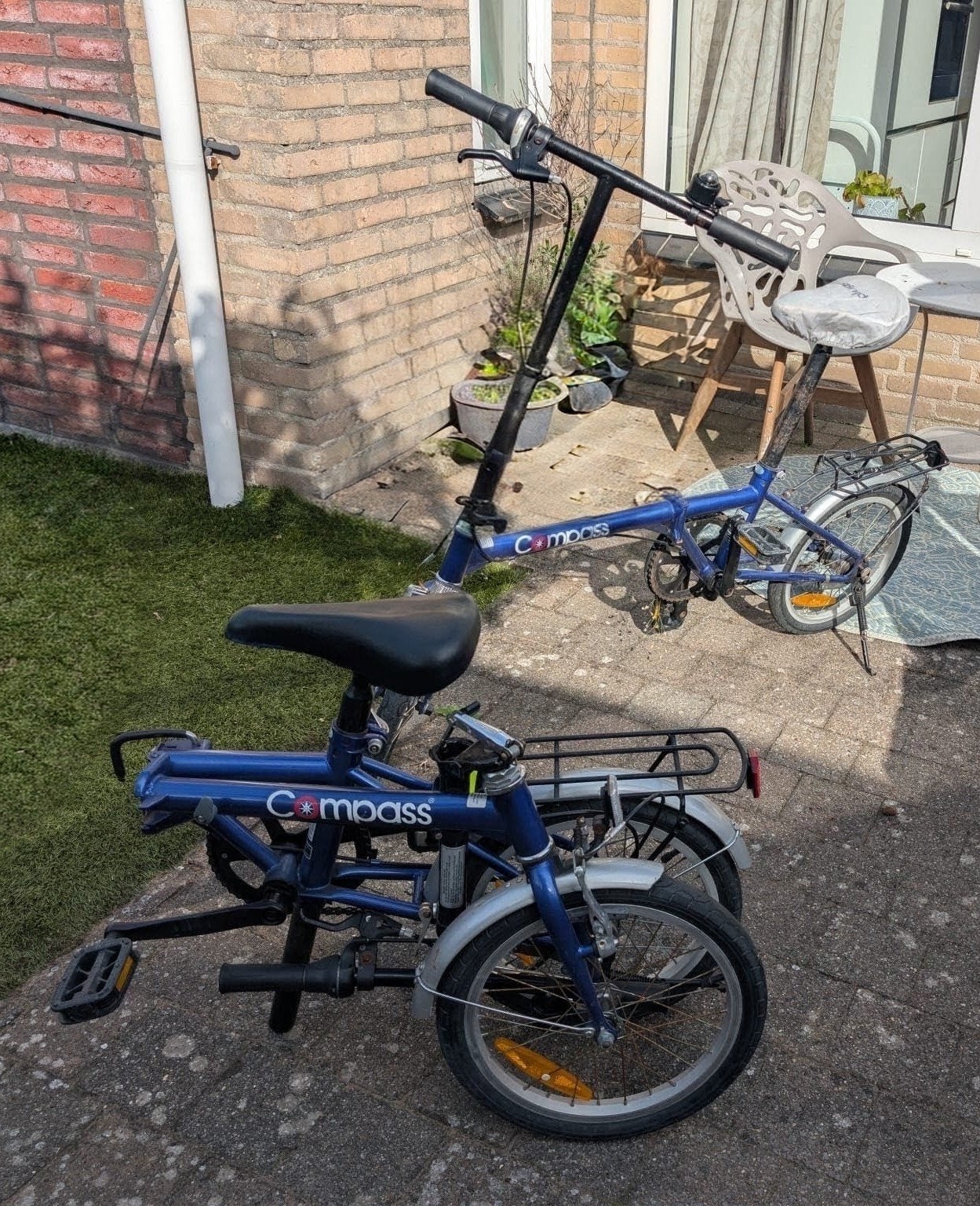 2 Compass vouwfietsen met hoes en pakkendrager, Fietsen en Brommers, 20 inch of meer, Gebruikt, Velgrem, Versnellingen