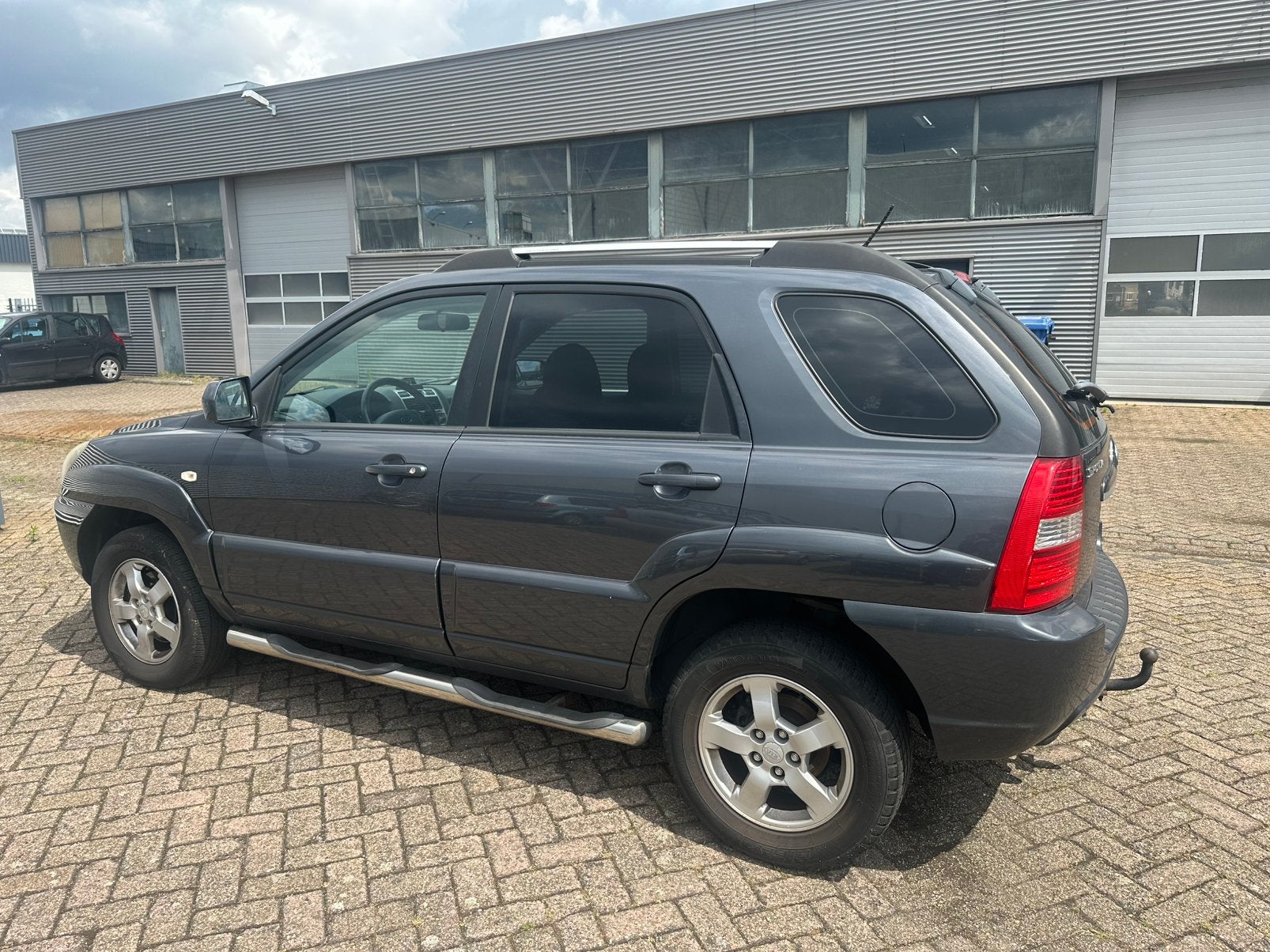 Kia Sportage 2.0 2WD 2008 Grijs, Auto's, 1442 kg, 4 cilinders, Origineel Nederlands, Handgeschakeld