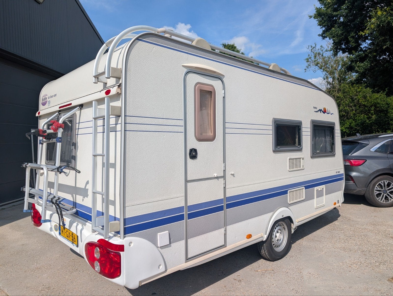 HOBBY 440 sf 2006 mover voortent met luifel, Rondzit, Hobby, Bedrijf, 5 tot 6 meter