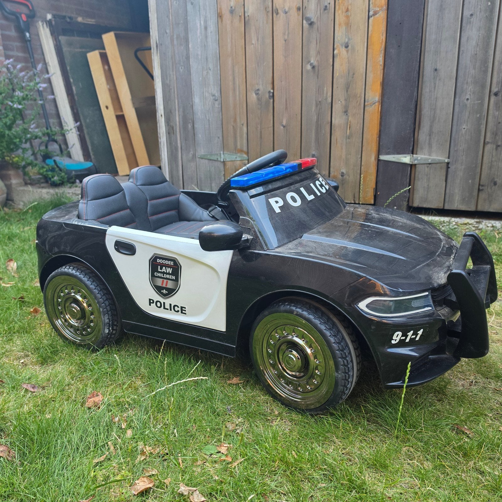 Politie auto kids alles werkend, Ophalen