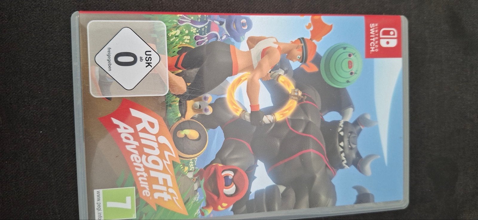 Foto 8 van Nintendo Switch met 2 controllers en 4 spellen