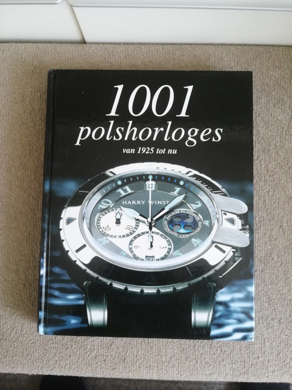Horloge boek 1001 polshorloges, Ophalen of Verzenden, Zo goed als nieuw