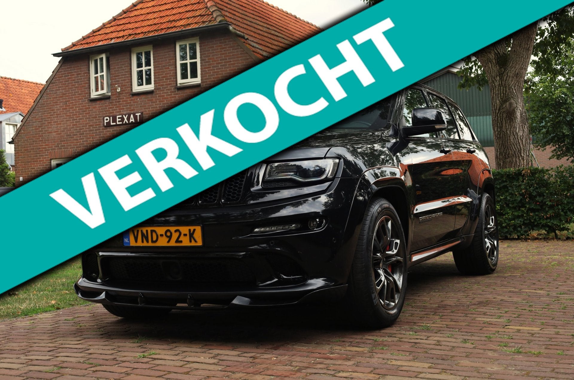 Jeep Grand Cherokee 6.4 V8 SRT8 Aut. | Grijs Kenteken | LPG-, Auto's, Dealer onderhouden, Gebruikt, Zwart, Leder