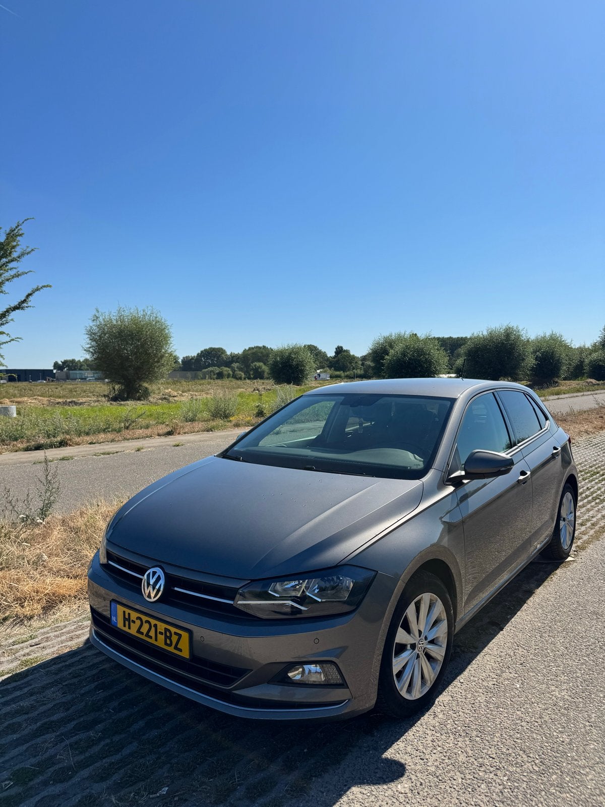 Volkswagen Polo 1.0 TSI 95pk 2020 Grijs, Auto's, Voorwielaandrijving, Stof, 95 pk, 1055 kg
