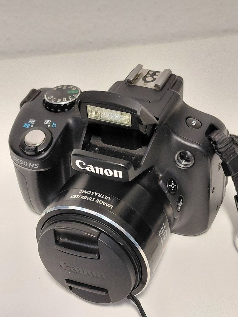 Canon Powershot SX50 HS bridgecamera / superzoom (Z.G.A.N), Audio, Tv en Foto, 12 megapixels, Ophalen of Verzenden, Zo goed als nieuw