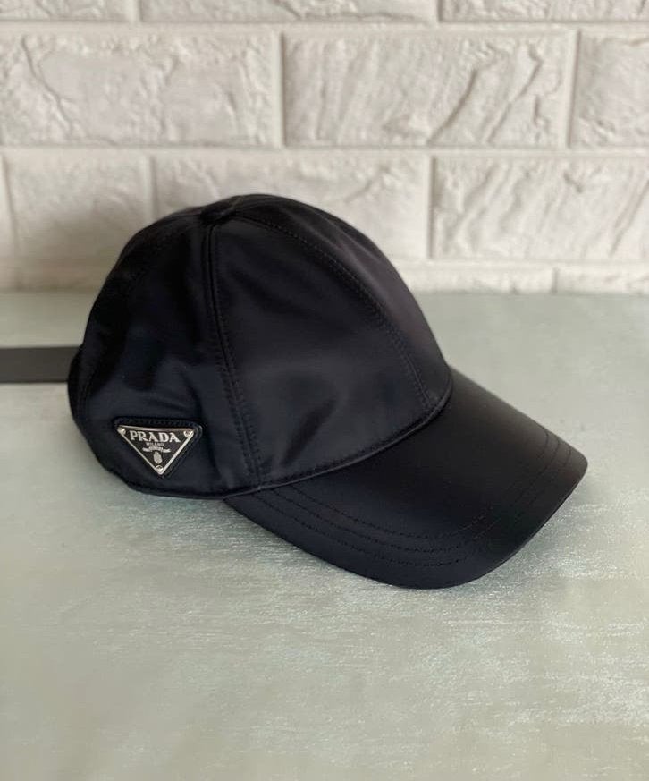 Zwarte prada pet, Kleding | Heren, Hoeden en Petten, Verzenden, Zo goed als nieuw