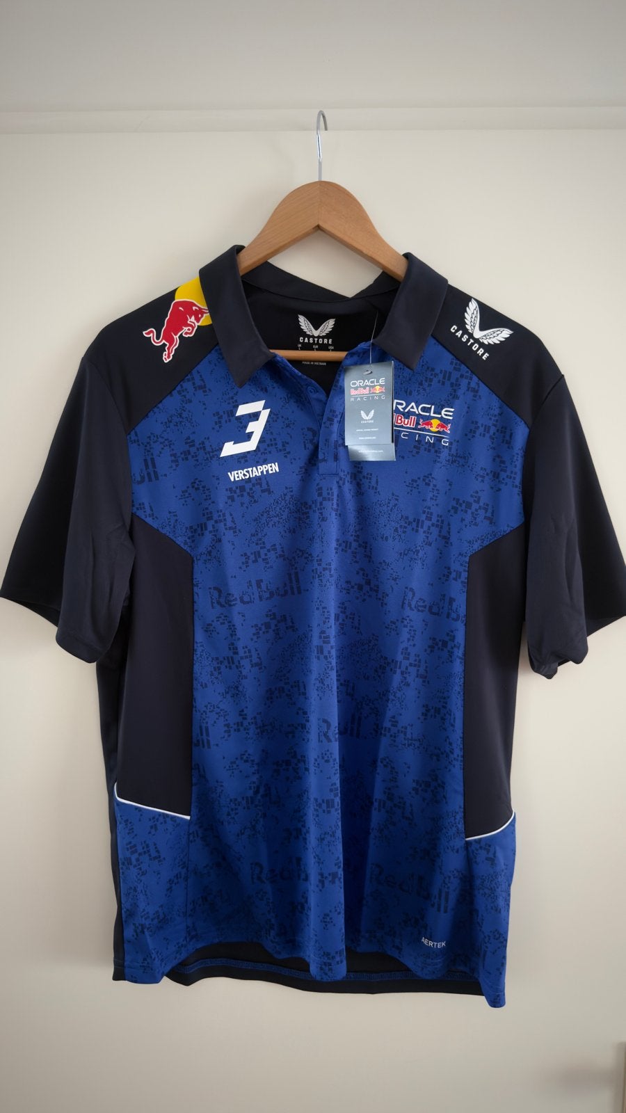 Red Bull Racing 2026 Max Verstappen Team Polo Maat L nieuw, Ophalen of Verzenden, Nieuw, Maat 52/54 (L), Blauw