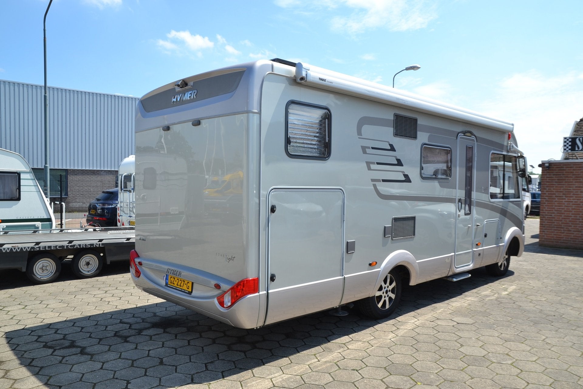 Hymer Eriba B 585 Star-Light - Automaat - 2x Airco - Navi+Ca, Luifel, Ringverwarming, Afzuigkap, 7 tot 8 meter
