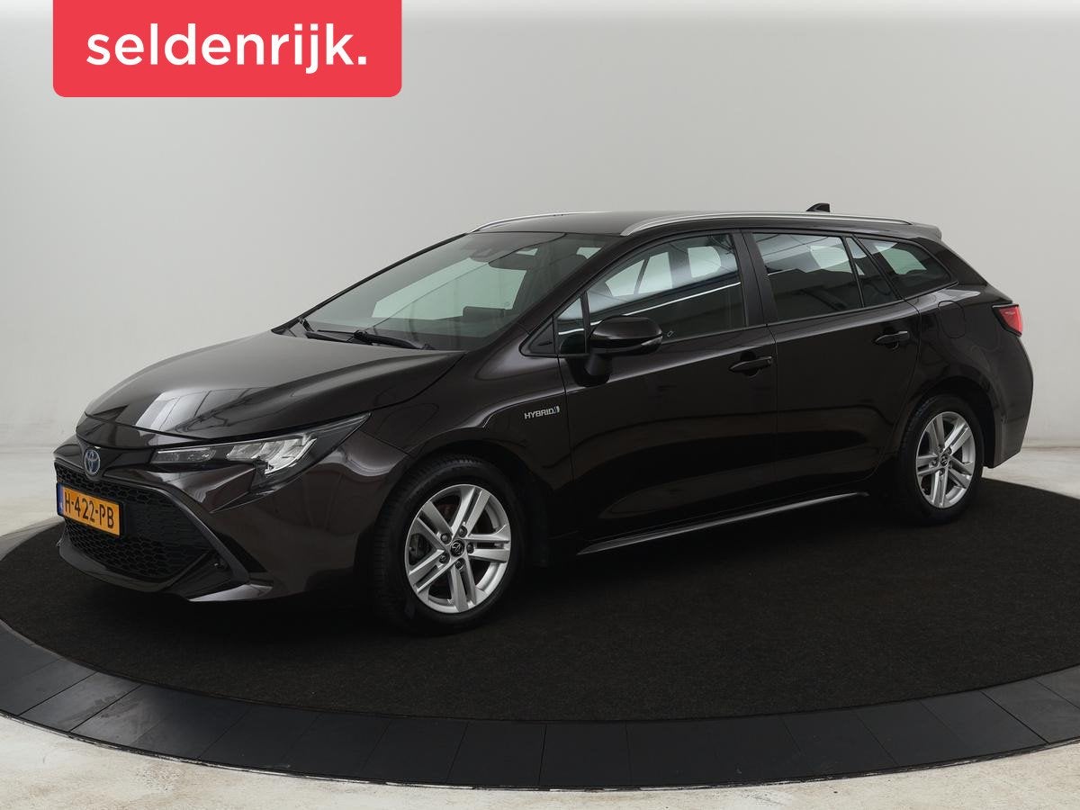 Toyota Corolla 1.8 Hybrid Active | 1e eigenaar | Carplay | A, Auto's, Gebruikt, 4 cilinders, Bruin, 122 pk