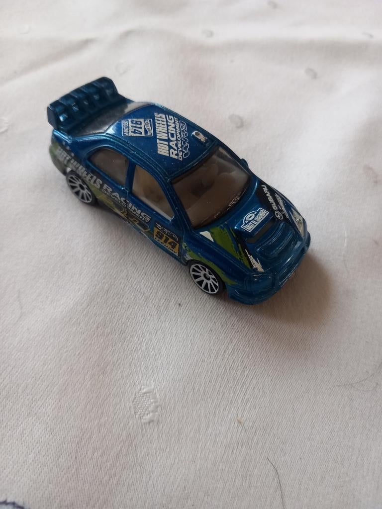 Subaru impreza, Hobby en Vrije tijd, Modelauto's | 1:87, Ophalen of Verzenden, Zo goed als nieuw, Auto, Overige merken