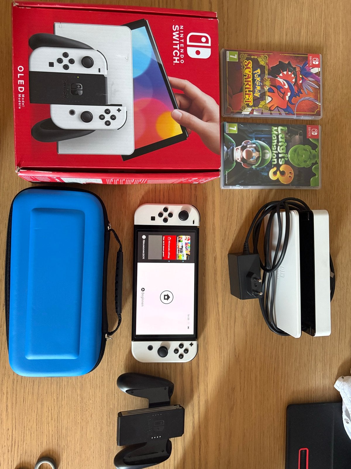 Nintendo Switch OLED met 2 games en accessoires, Spelcomputers en Games, Spelcomputers | Nintendo Switch, Zo goed als nieuw, Switch OLED