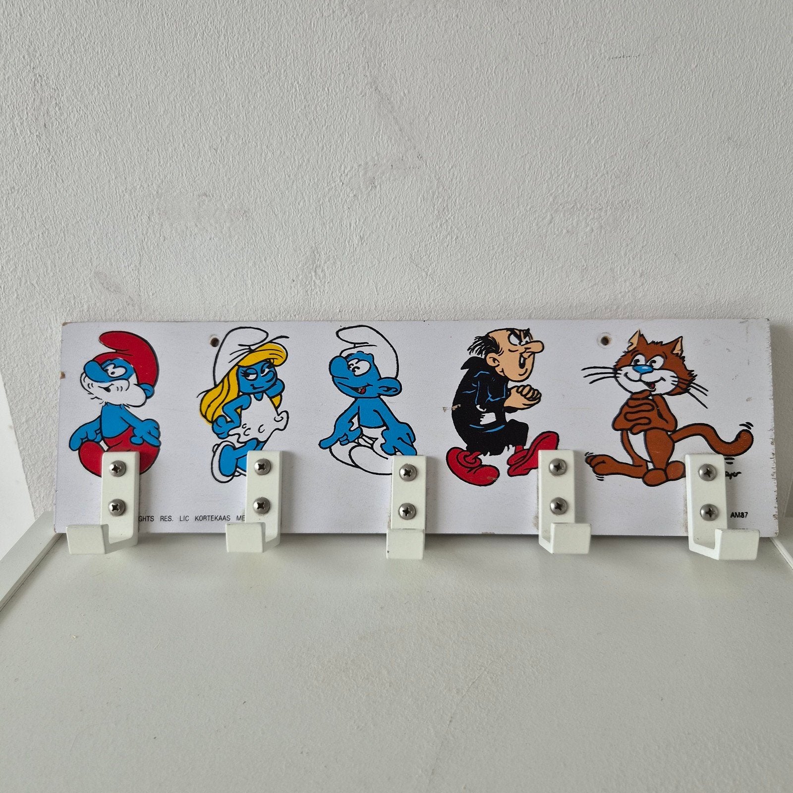 Peyo Smurfen wandkapstok met 5 haken, Wandkapstok, Ophalen of Verzenden, Zo goed als nieuw, Minder dan 100 cm