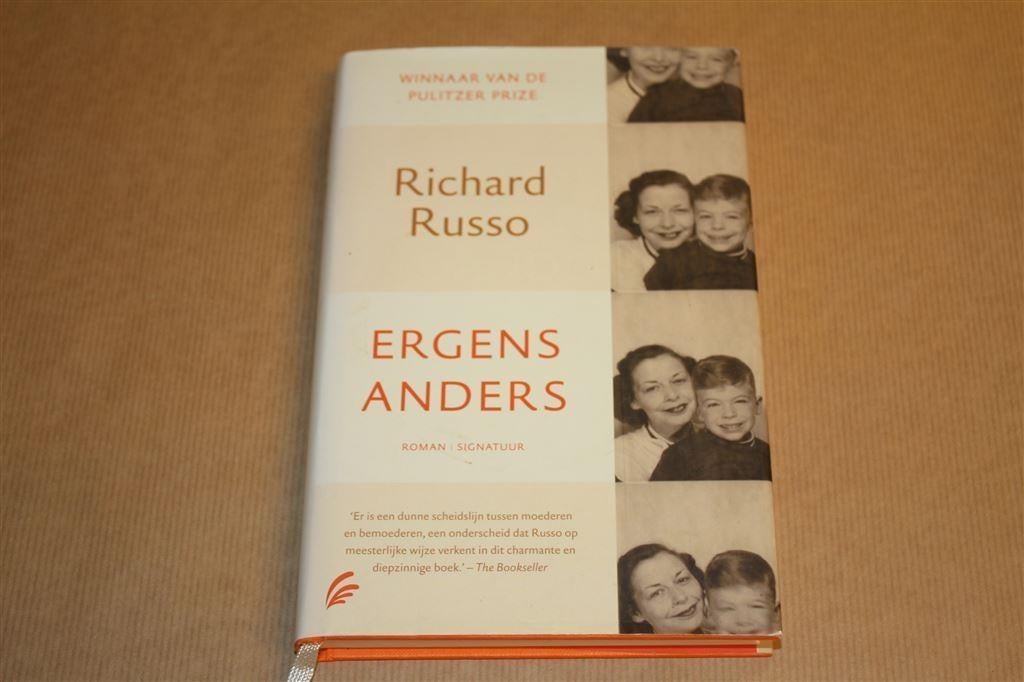 Ergens anders. Richard Russo., Boeken, Romans, Zo goed als nieuw, Ophalen of Verzenden