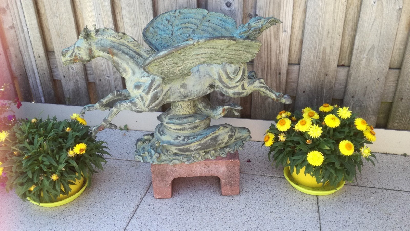 bronzen beeld mythologie, Ophalen