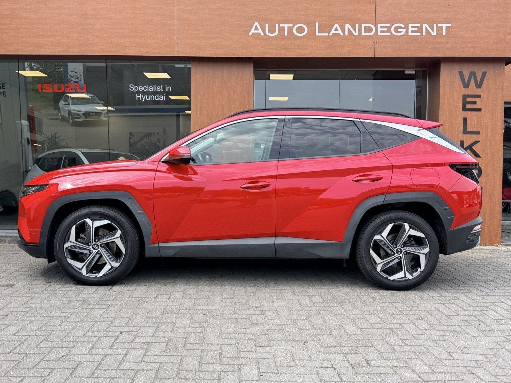 Hyundai Tucson 1.6 T-GDI HEV Comfort Plus Sky | Schuif/Kante, Auto's, Hyundai, 12 maanden, Stof, Gebruikt, 4 cilinders