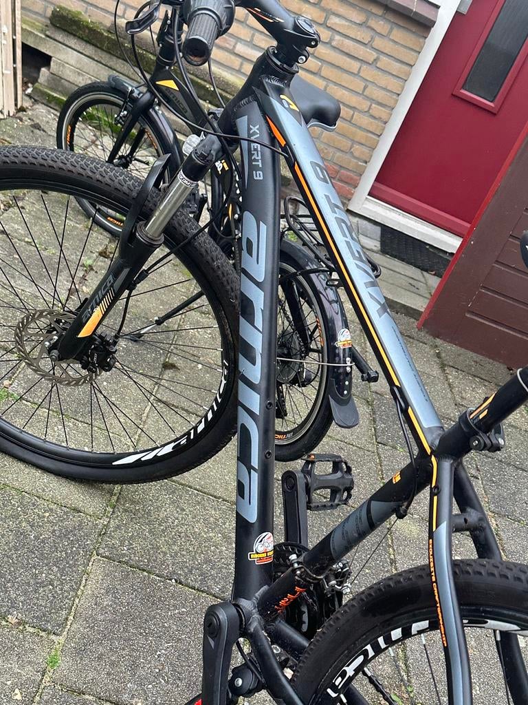 Arnica Xvert 9 Mountainbike - Zwart met oranje details, Fietsen en Brommers, Fietsen | Mountainbikes en ATB, Gebruikt, Heren, Overige merken