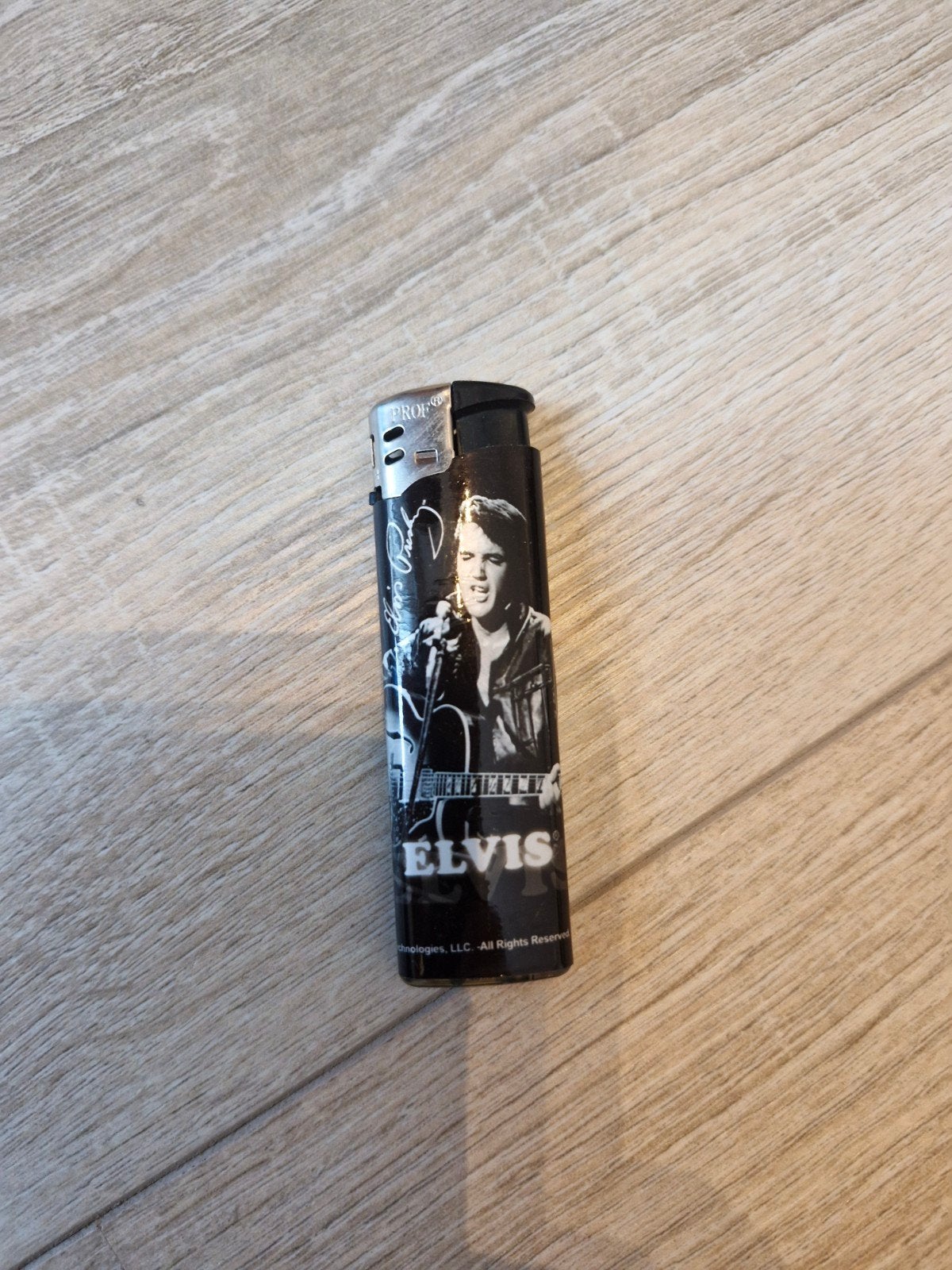 Elvis Presley aansteker - Zwart met afbeelding, Ophalen of Verzenden, Gebruikt, Aansteker