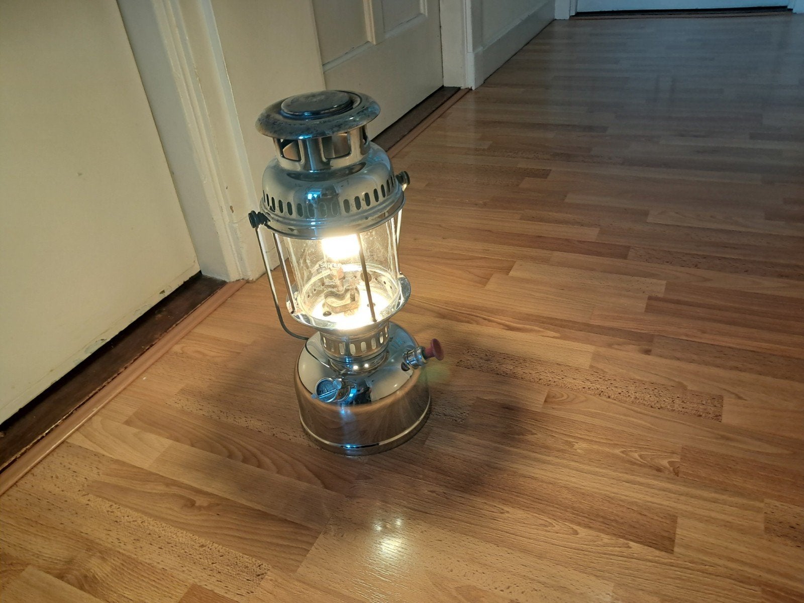 Petroleum vergasser lamp, Ophalen