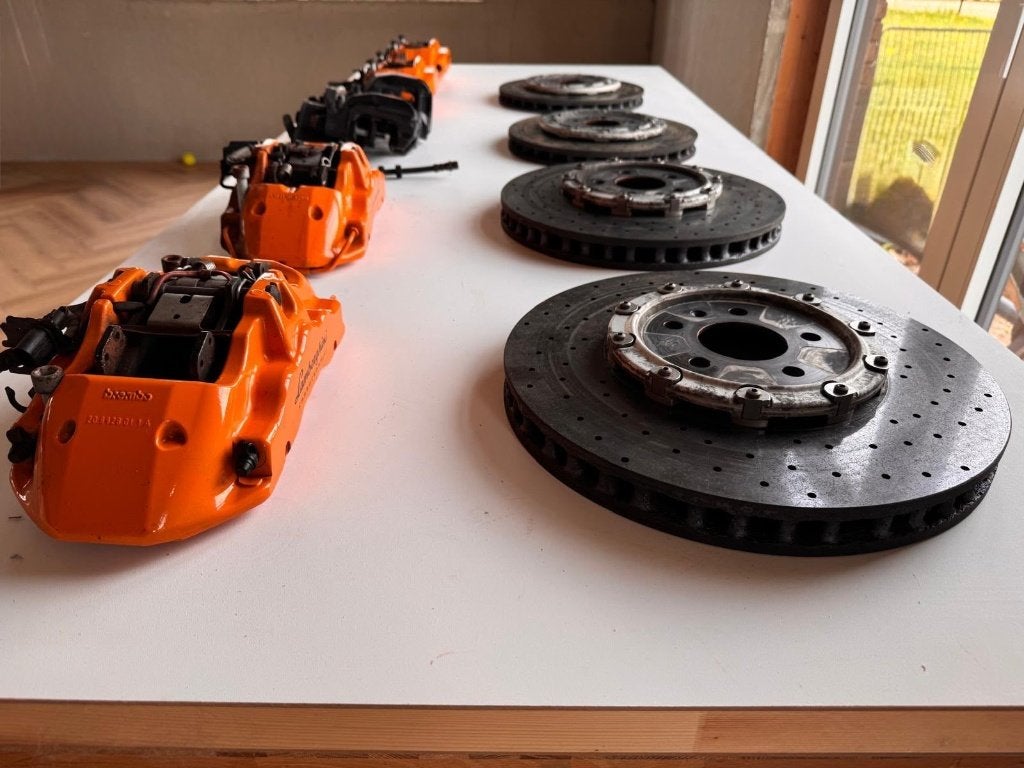 Originele Lamborghini Carbon Ceramic remmenset – Oranje, Ophalen of Verzenden, Gebruikt