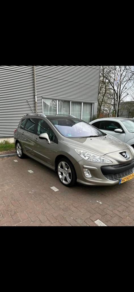 Peugeot 308 1.6 THP 103KW SW 7P AUT 2010 Grijs, Auto's, Peugeot, 4 cilinders, 7 stoelen, Stationwagon, Particulier