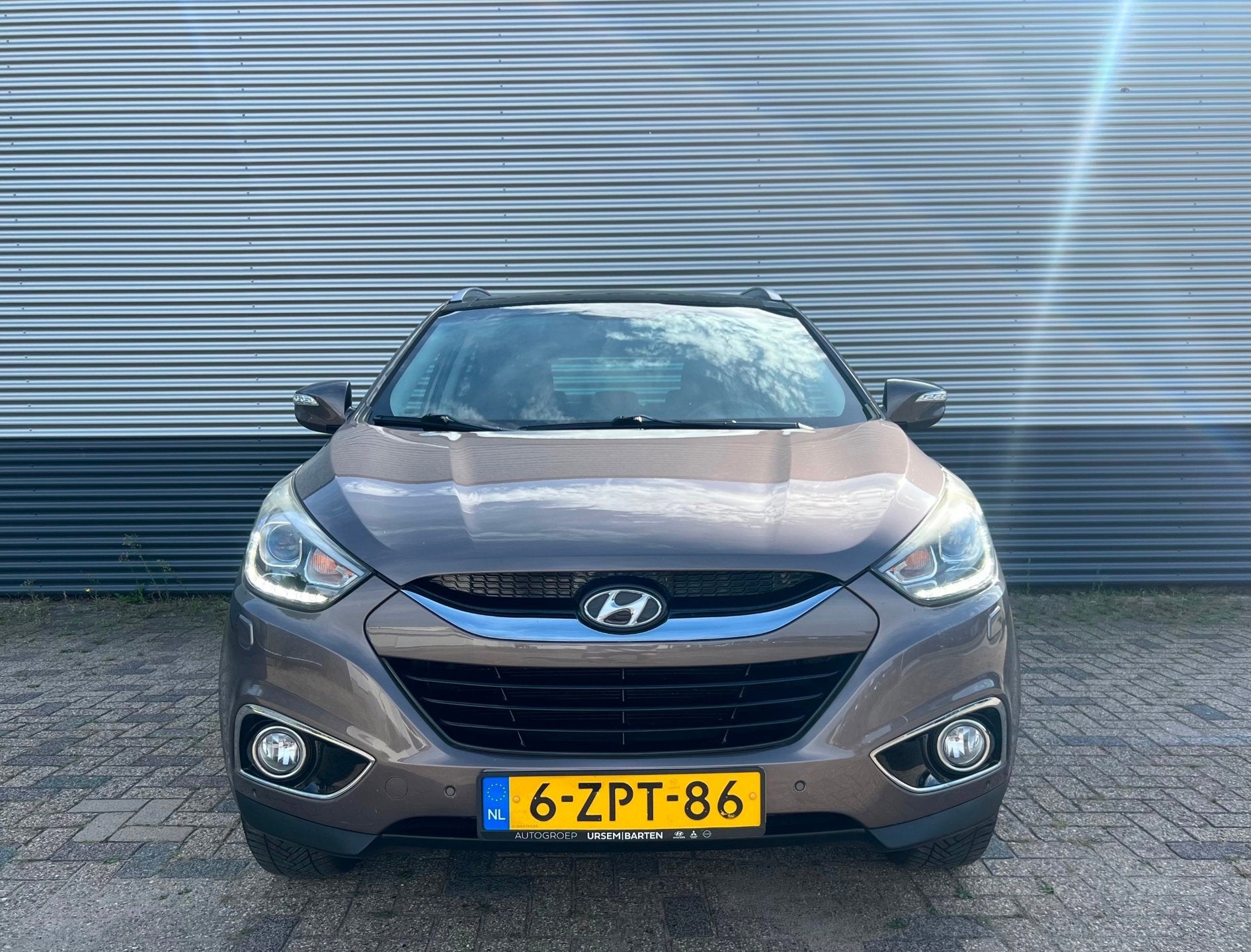 Hyundai Ix35 2.0i i-Catcher AUTOMAAT | PANO | TREKHAAK | CAM, Gebruikt, Zwart, 4 cilinders, Bruin