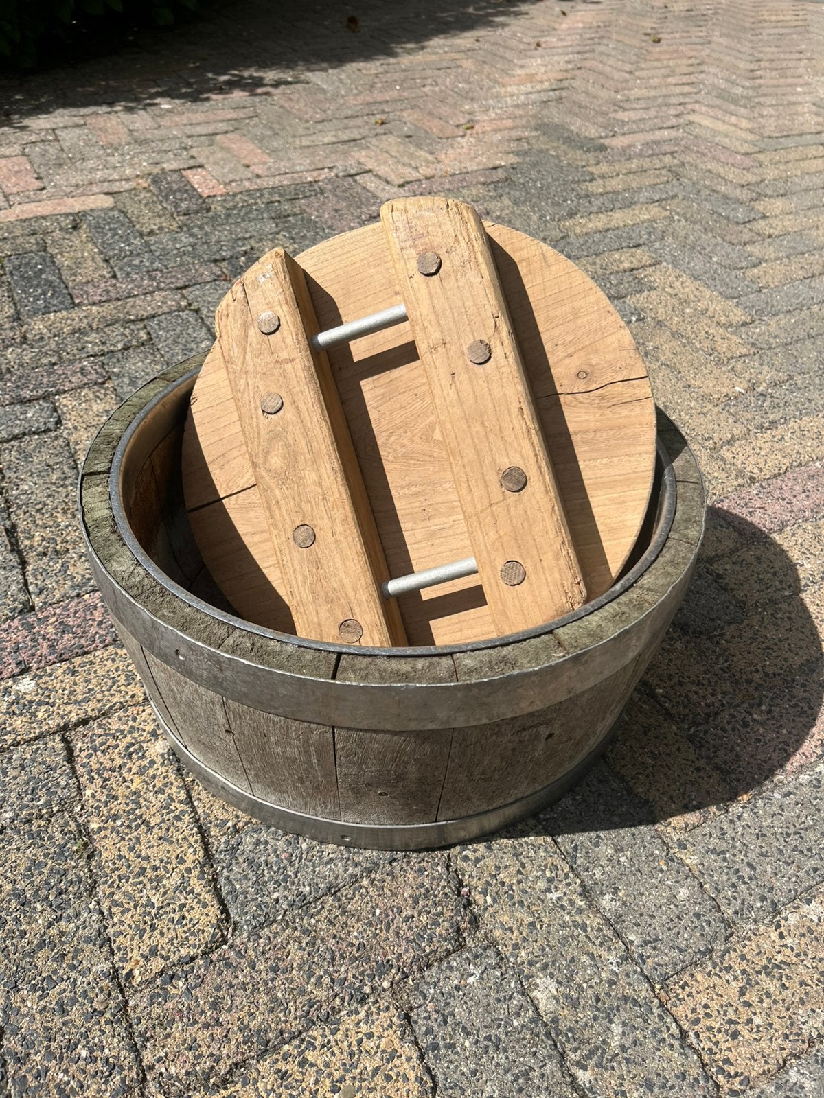 Antiek houten kaasvat, Ophalen