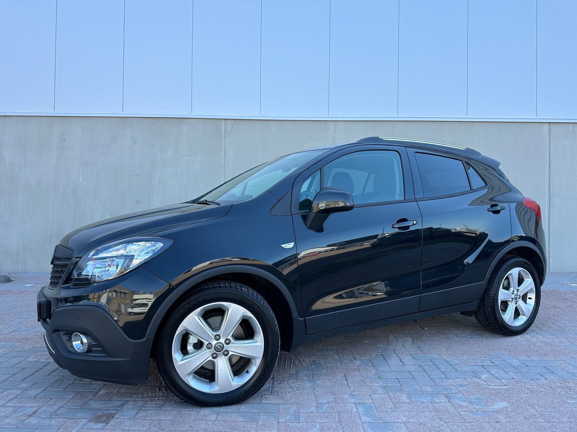 Opel Mokka 1.4 T Edition 4x4 Climate C, Cruise C, Pdc, Lmv, Auto's, 1345 kg, Stof, Gebruikt, Zwart