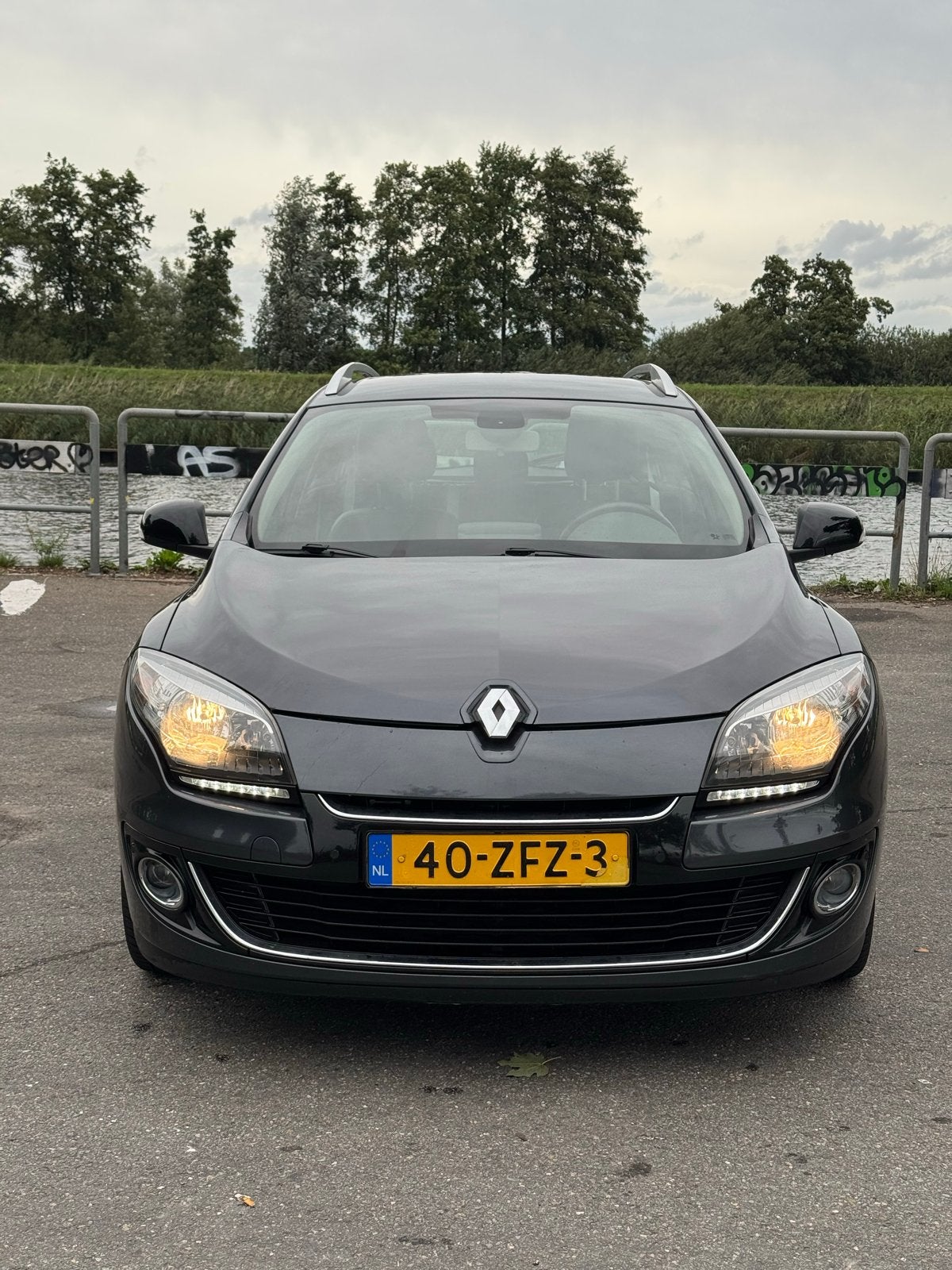 Renault Mégane 1.2 TCE 85KW Energy Estate 2012 Grijs, Auto's, Voorwielaandrijving, 4 cilinders, Origineel Nederlands, Handgeschakeld