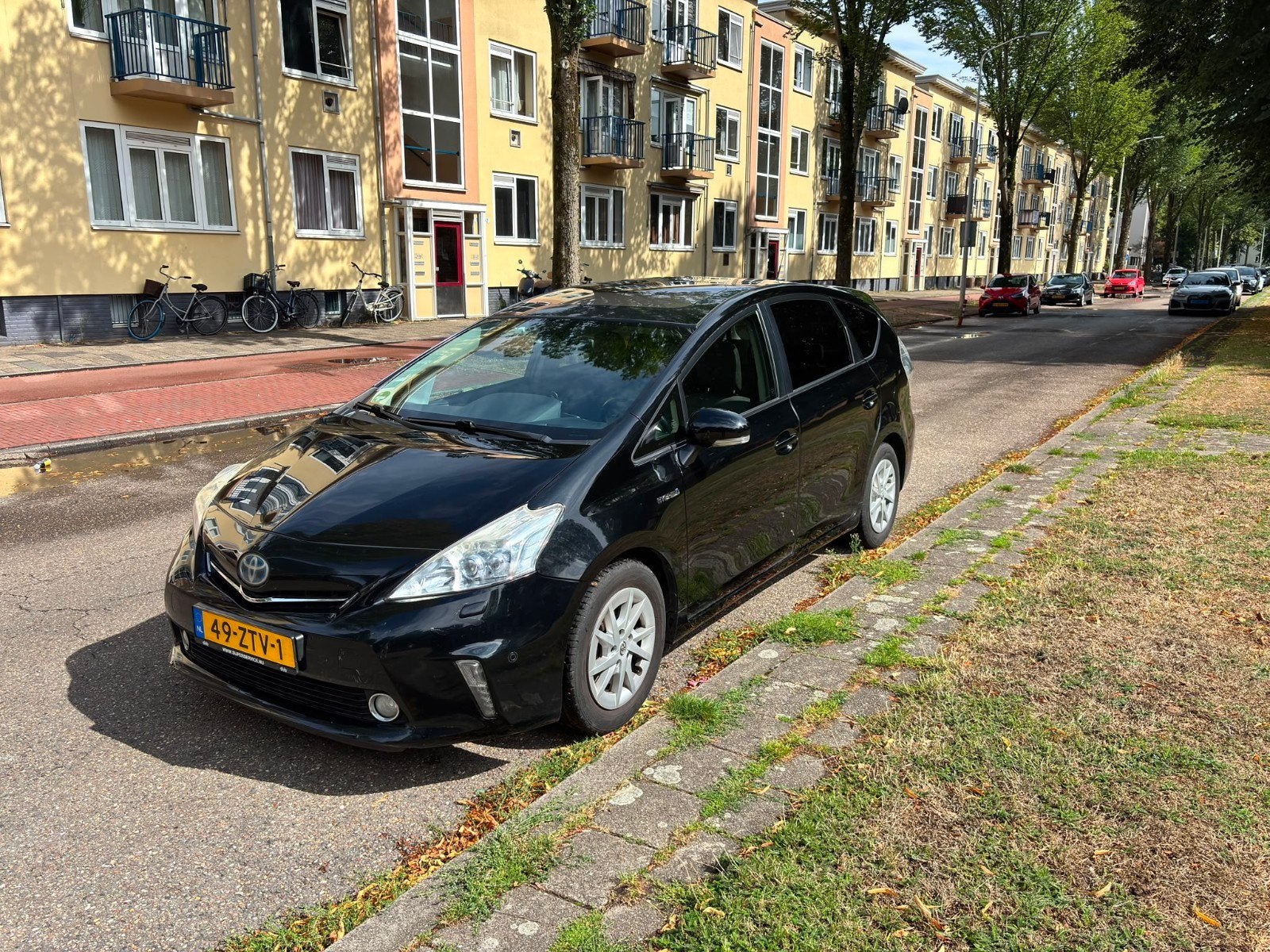 Toyota Prius Wagon Dynamic Business Carplay-JBL -adapt.cruis, 4 cilinders, 7 stoelen, Zwart, Origineel Nederlands