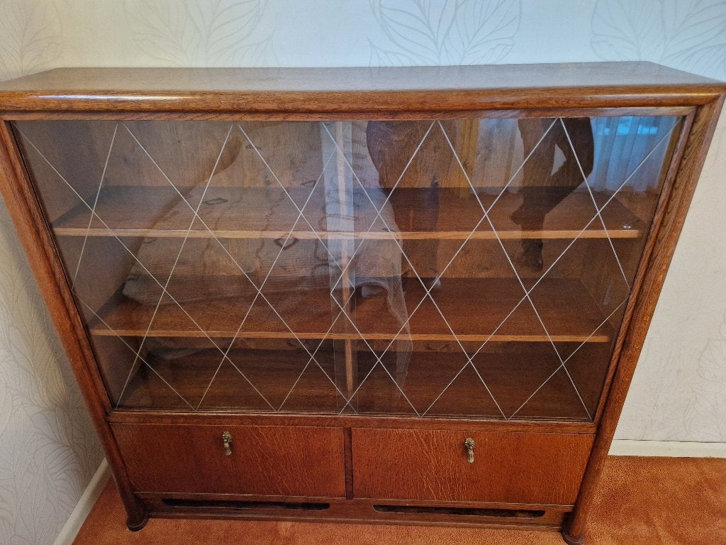 boekenkast met geslepen glazen schuifdeuren 80+ jaar oud., Ophalen, Gebruikt, 100 tot 150 cm, Glas