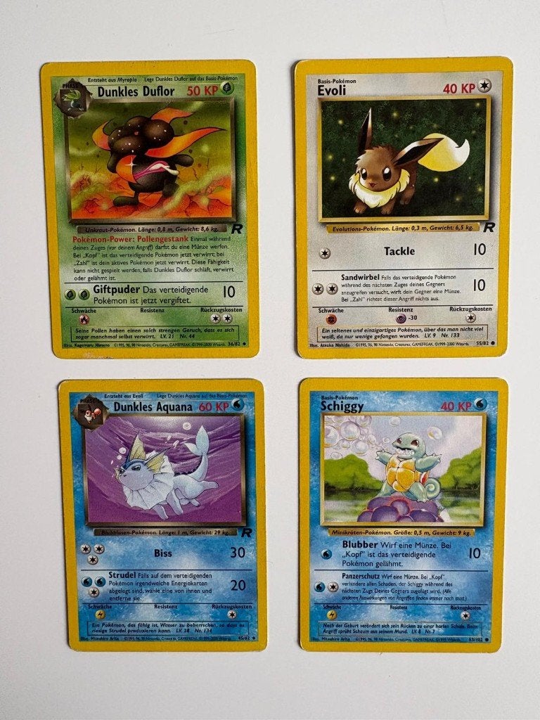 4 german Team Rocket cards, Ophalen of Verzenden, Zo goed als nieuw, Meerdere kaarten