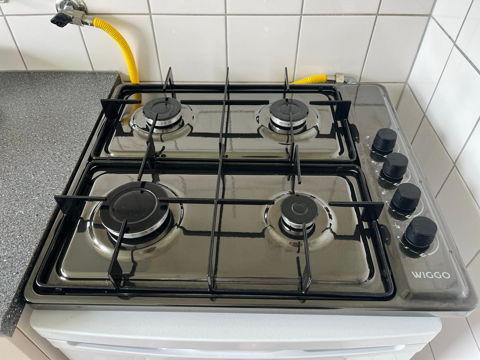 Wiggo WH-G604F(T) Vrijstaande Gaskookplaat - Z.G.A.N., Witgoed en Apparatuur, Fornuizen, Ophalen, 4 kookzones, Zo goed als nieuw