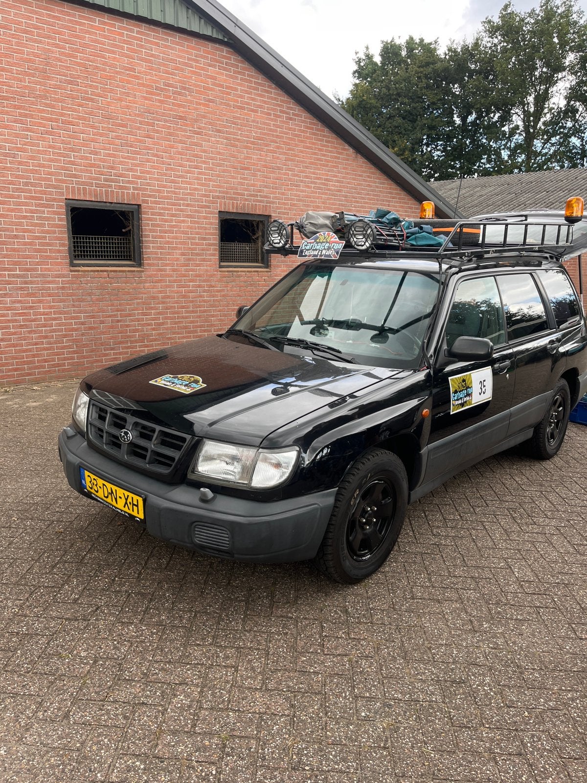Subaru Forester 2.0 92KW 1999 Zwart, Auto's, 4 cilinders, Zwart, Particulier, 4x4
