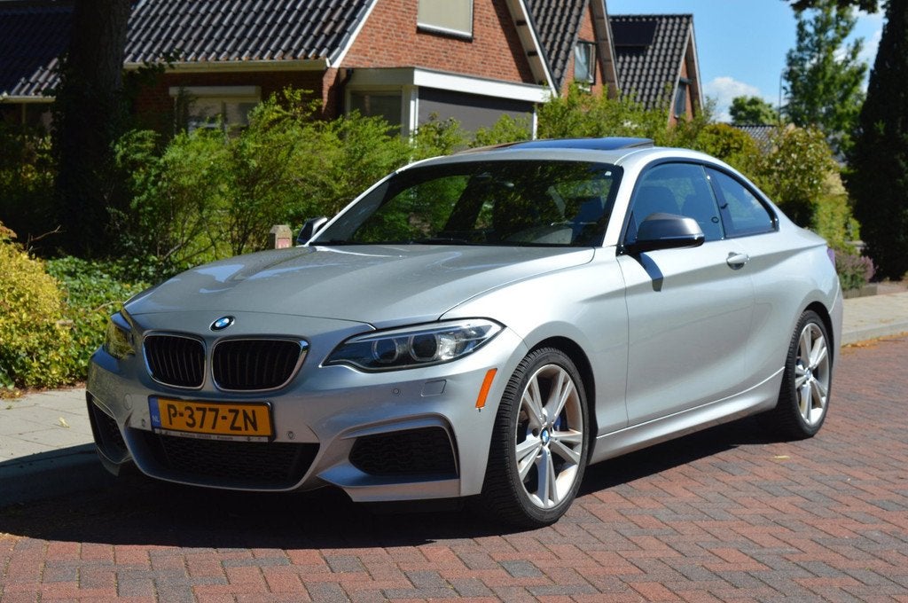 BMW 2-serie Coupé M235i Centennial High Exe schuifdak, Auto's, BMW, Bedrijf, Te koop, 2-Serie, Achteruitrijcamera, Airbags, Airconditioning