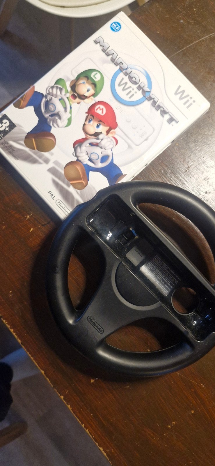 Mario Kart Wii met stuur - Compleet uren lang raceplezier, Gebruikt, Racen en Vliegen, Ophalen of Verzenden, Eén computer