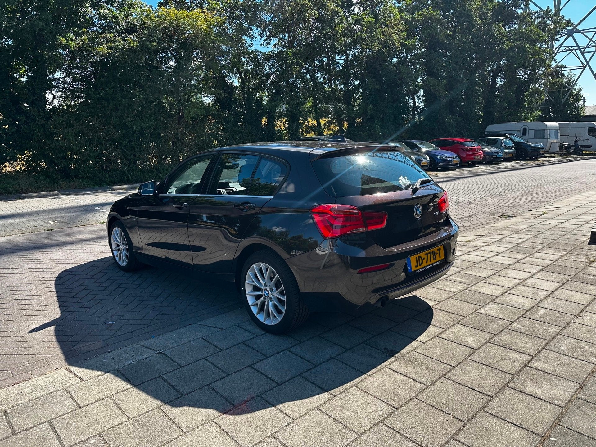 BMW 1-serie 118i Sport, Gebruikt, 4 cilinders, Bruin, Origineel Nederlands