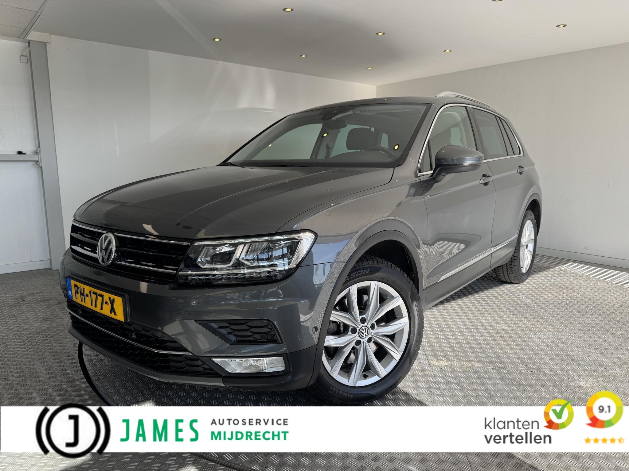 Volkswagen Tiguan 2.0 TSI 4Motion Highline, Auto's, Automaat, Stof, Gebruikt, 4 cilinders