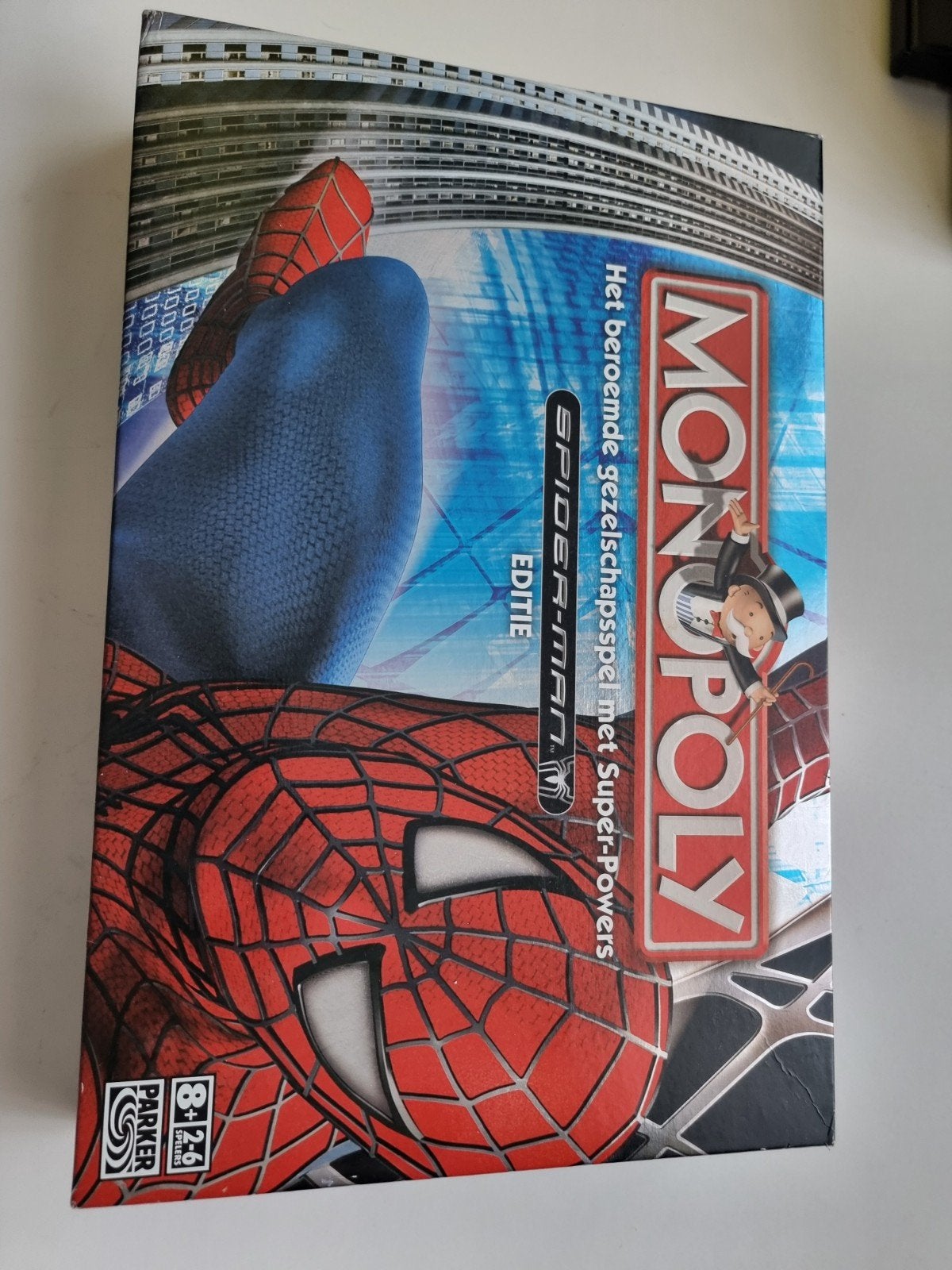 Monopoly Spider-Man Editie - Zo goed als nieuw, Hobby en Vrije tijd, Drie of vier spelers, Ophalen of Verzenden, Zo goed als nieuw