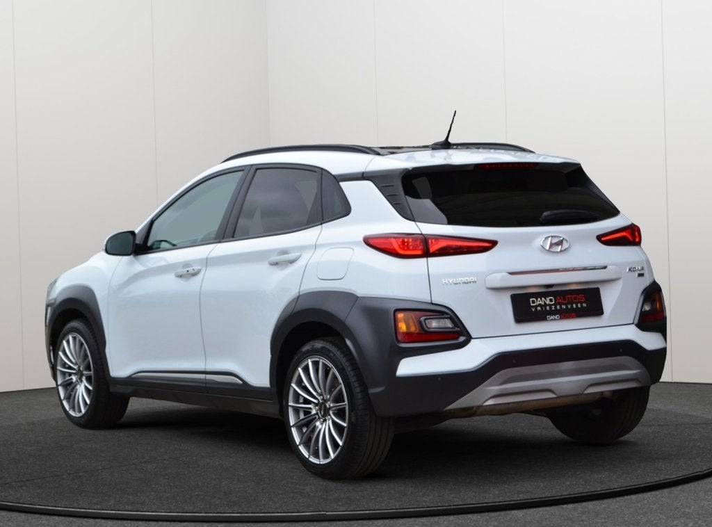 Hyundai KONA 1.6 T-GDI Premium 4WD 177PK Leer/Camera/HUD, Automaat, 4 cilinders, Automatische klimaatregeling, Wit