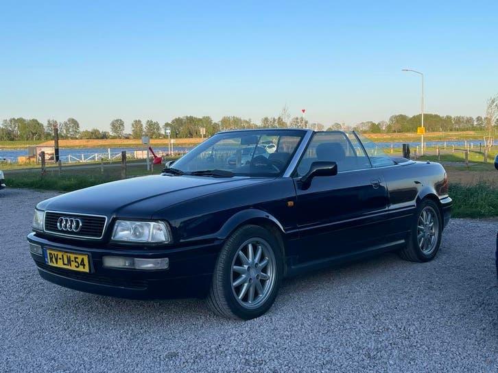 Audi Cabrio 2.6 E 110KW E2 1997 Blauw, Auto's, Voorwielaandrijving, Blauw, Leder en Stof, 2598 cc
