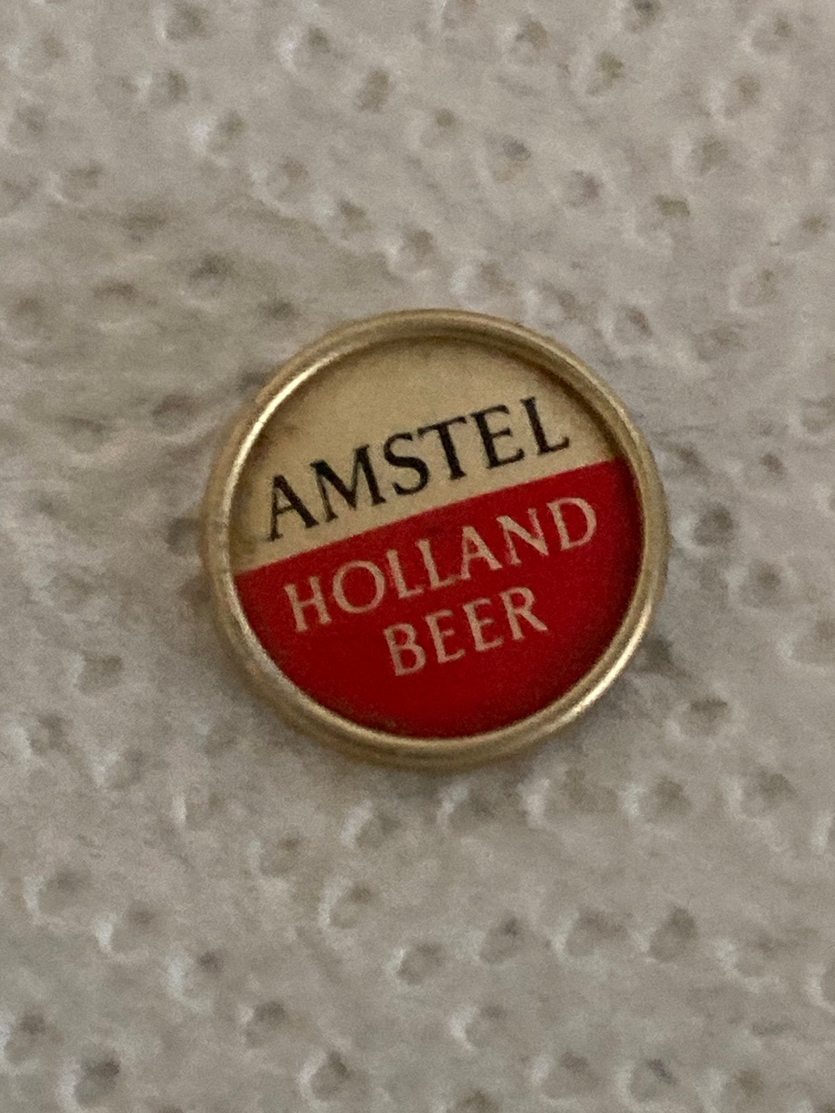 Amstel broche, Ophalen of Verzenden, Zo goed als nieuw