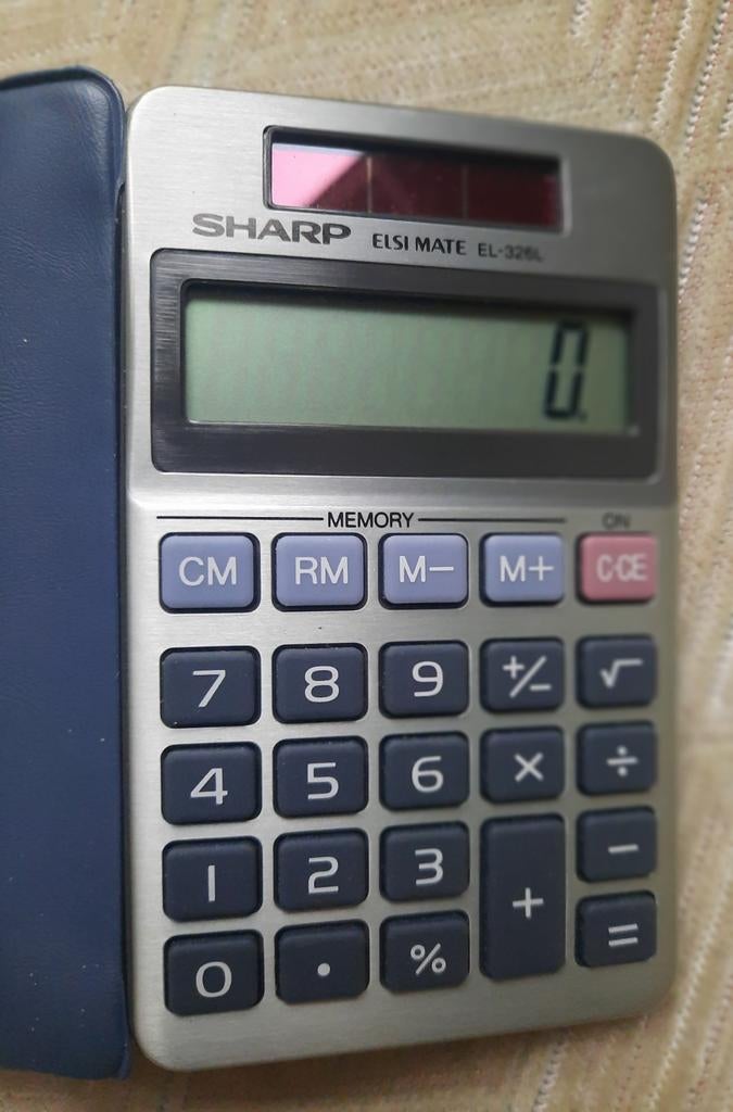Sharp rekenmachine,wie gebruikt die nog?, Diversen, Rekenmachines, Ophalen of Verzenden, Zo goed als nieuw
